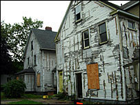 two boarded up houses in Cleveland